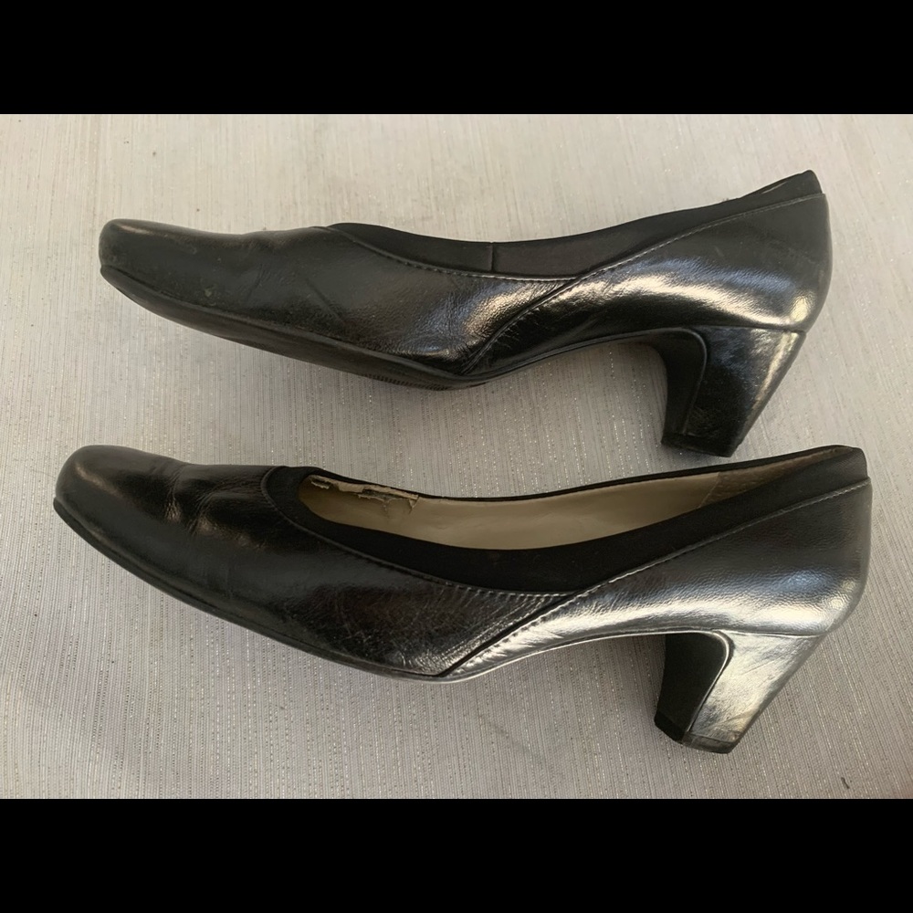 Black leather pumps